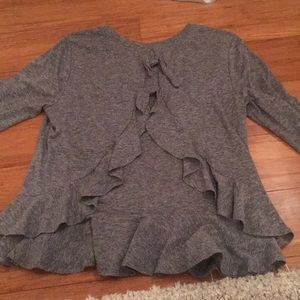 Francesca's top with bows and ruffles in back